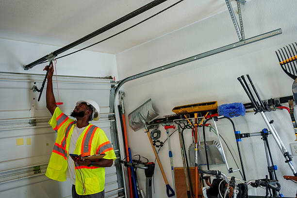 Professional Garage Door Maintenance technician working in New London, TX